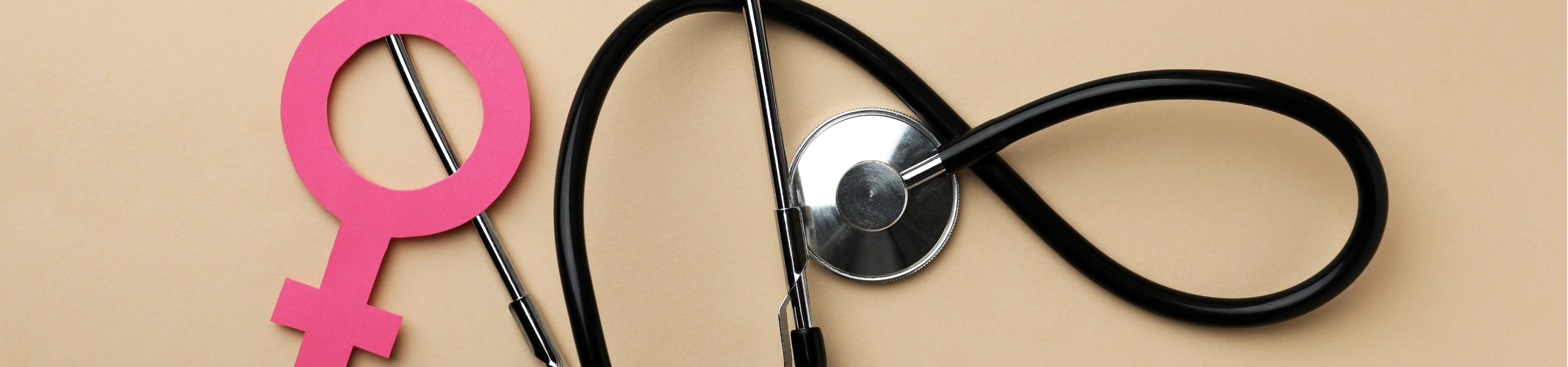 stethoscope and pink venus symbol