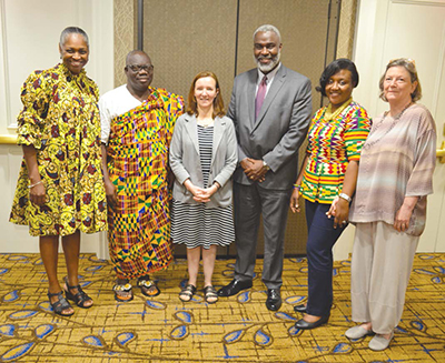 African delegates pose for photo with AU admin.