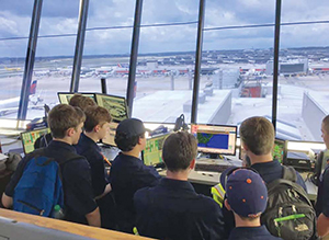 Students looking at instrument panels.