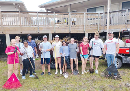 Auburn work group in Port St. Joe served at the St. Joseph Bay State Buffer Preserve.