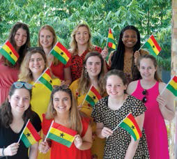 Group of people holding ghana flag