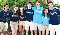 Group of seven summer camp counselors pose for photo together