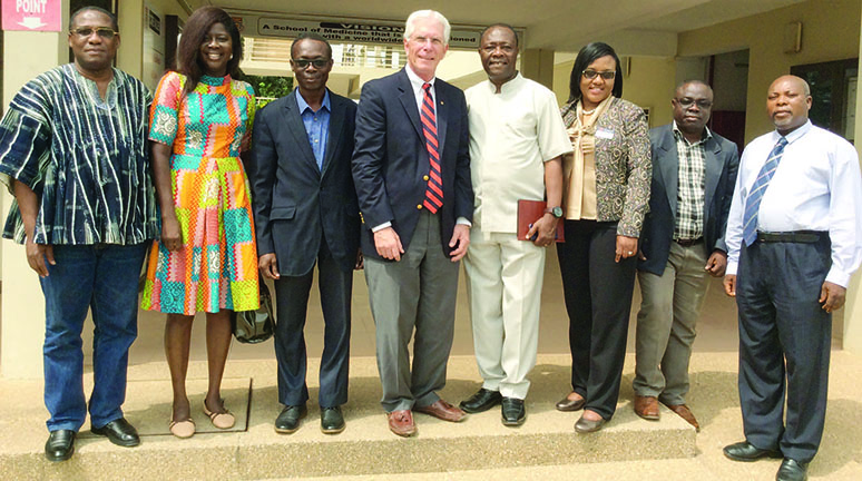 Members of Outreach Global pose for a group picture.