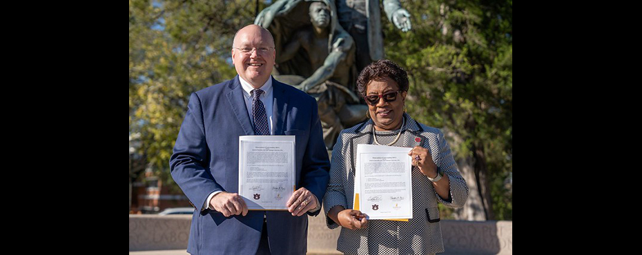 Auburn University President Christopher B. Roberts and Tuskegee University President Charlotte P. Morris stand with their signed Memorandum of Understanding at Tuskegee University on Monday afternoon. Photo by Stefan Smith, Tuskegee University